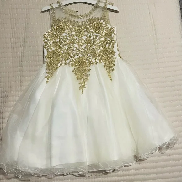 Dillard’s golden and ivory dress